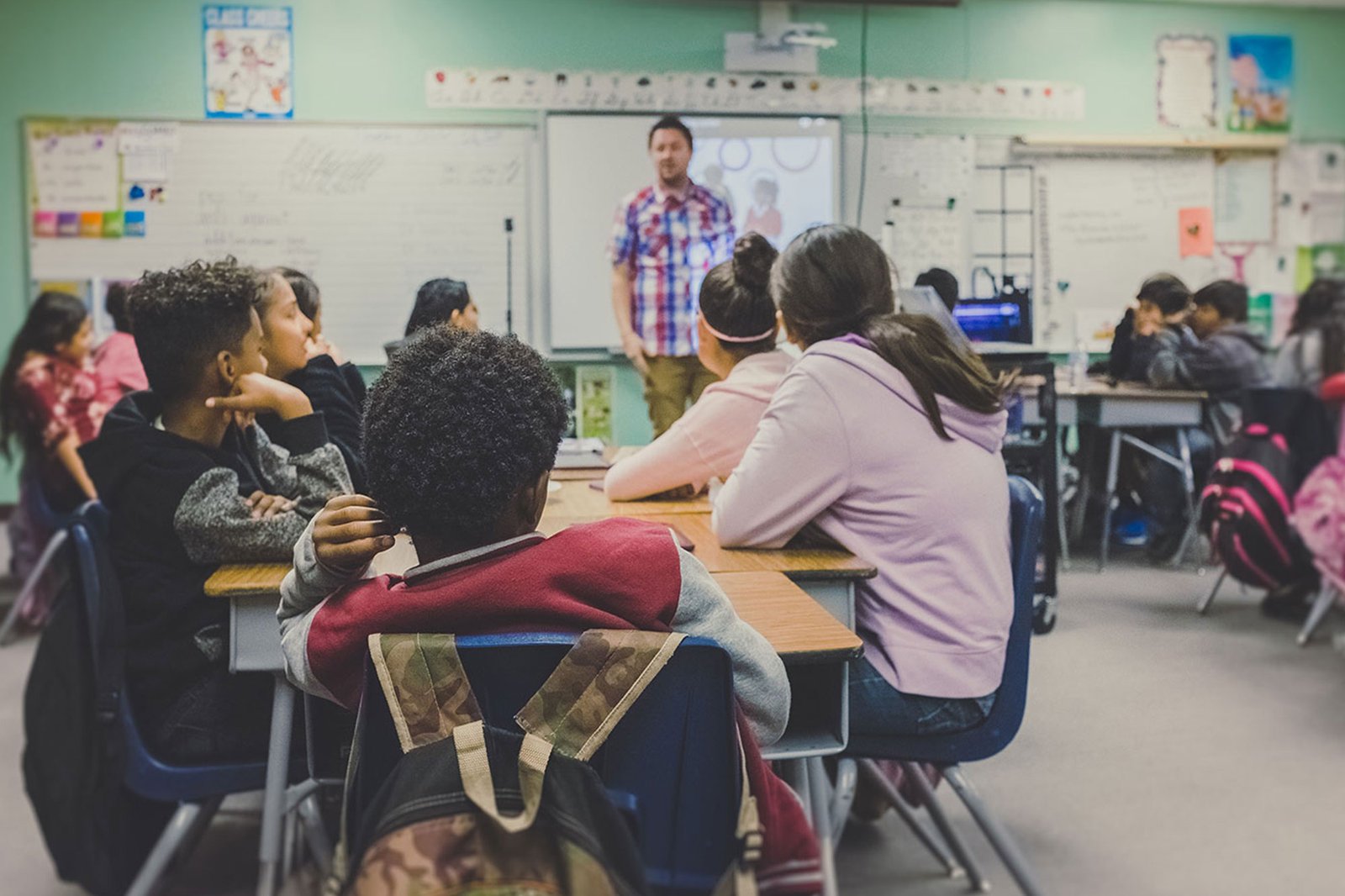 PlanningGrants Group of students in classroom looking at teacher